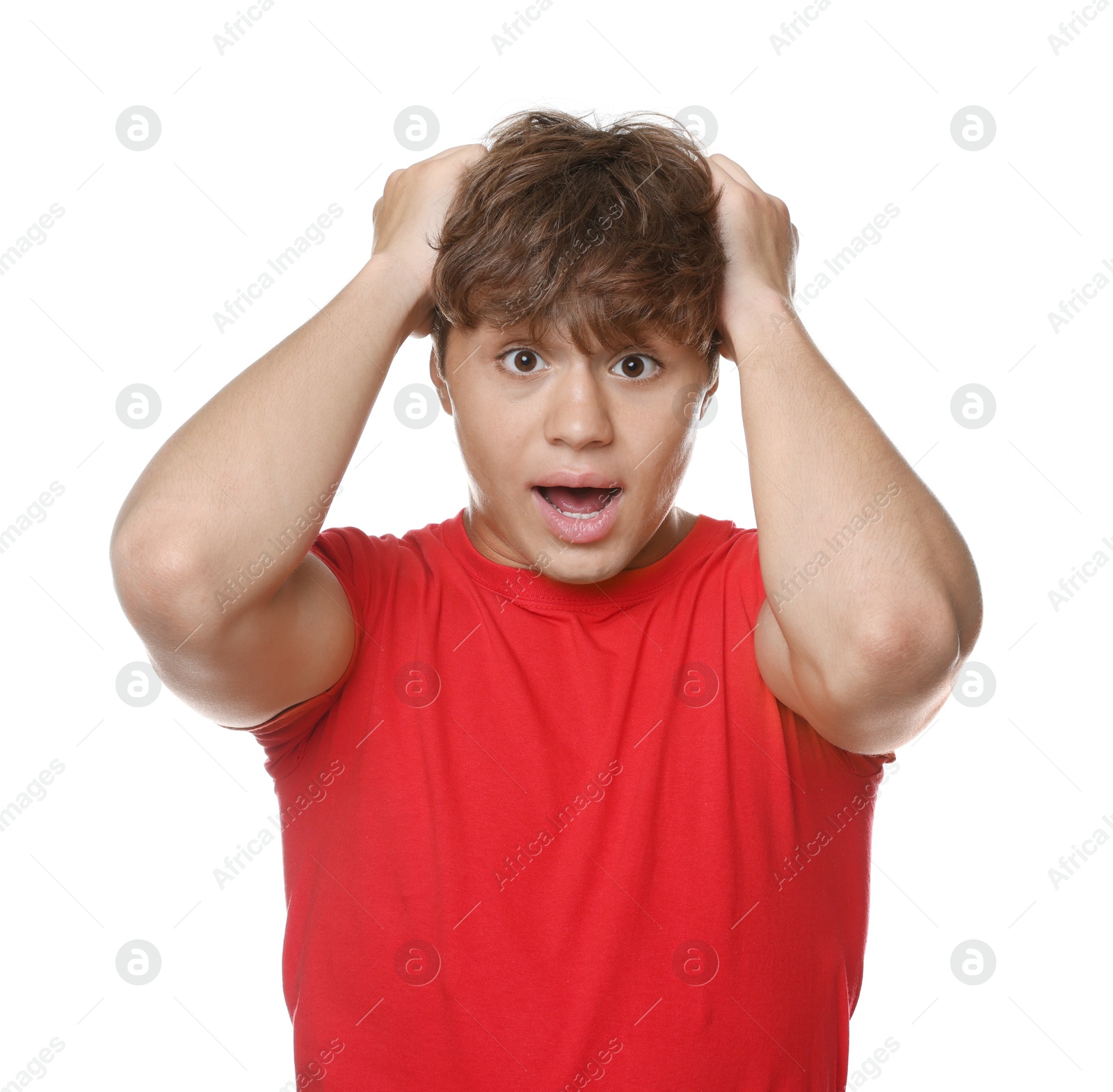 Photo of Teenage boy suffering from panic attack on white background