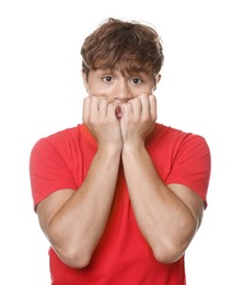 Photo of Teenage boy suffering from panic attack on white background