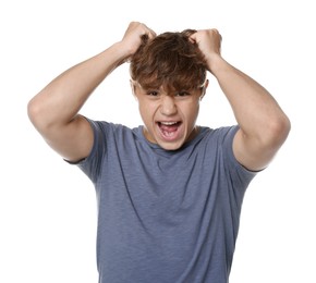 Photo of Teenage boy suffering from panic attack on white background