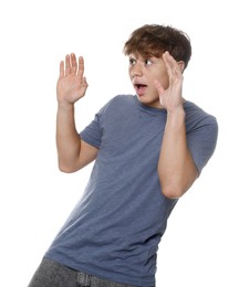 Photo of Teenage boy suffering from panic attack on white background