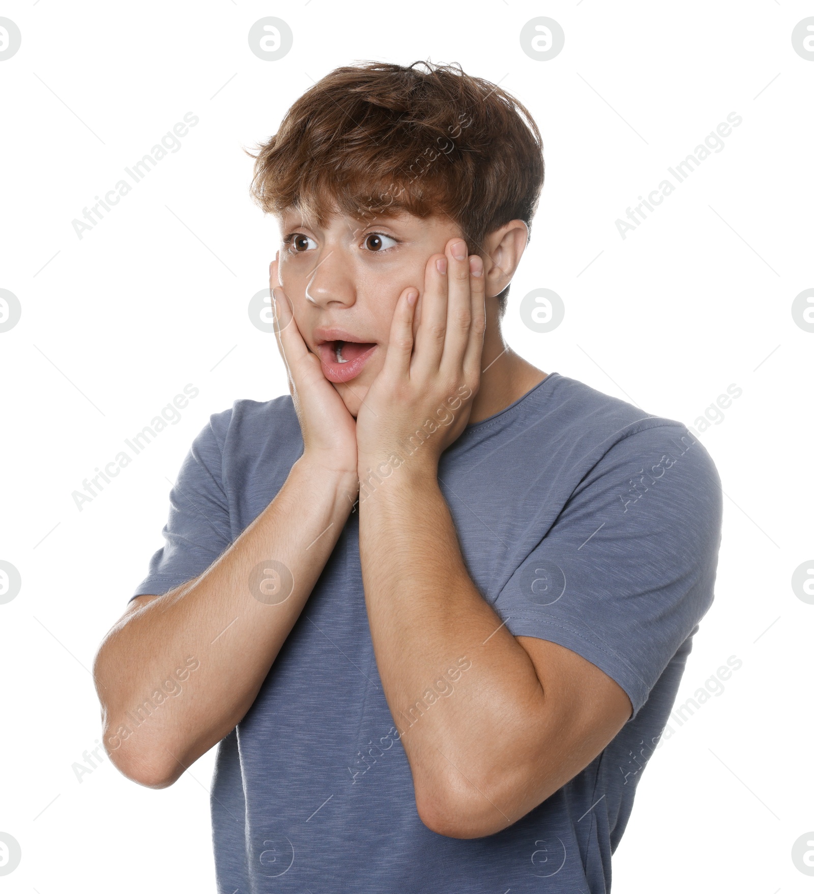 Photo of Teenage boy suffering from panic attack on white background