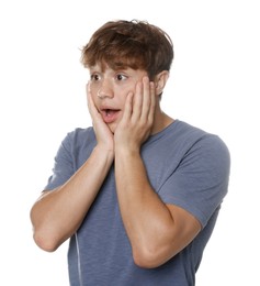 Photo of Teenage boy suffering from panic attack on white background