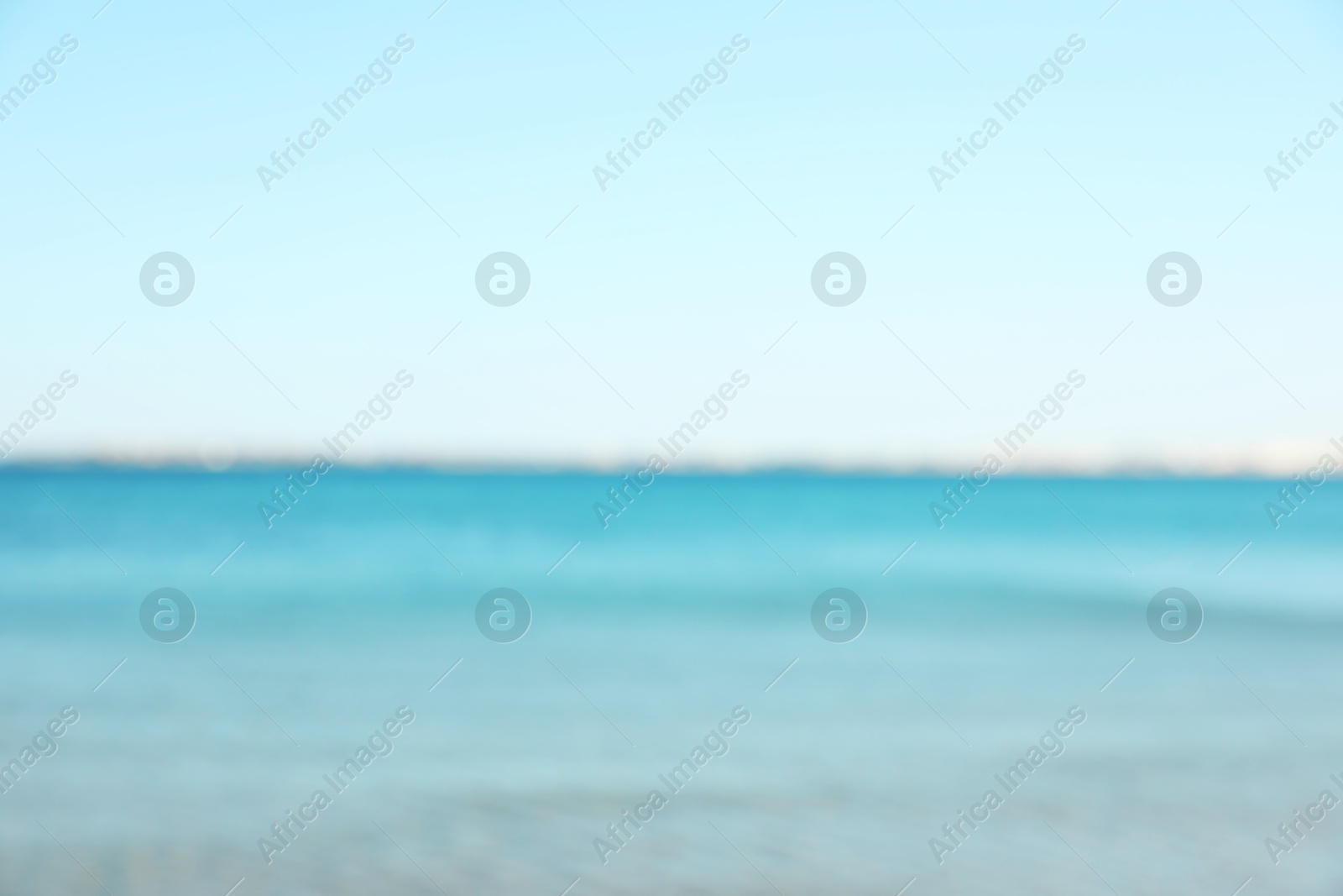 Photo of Beautiful sea under light blue sky, blurred view