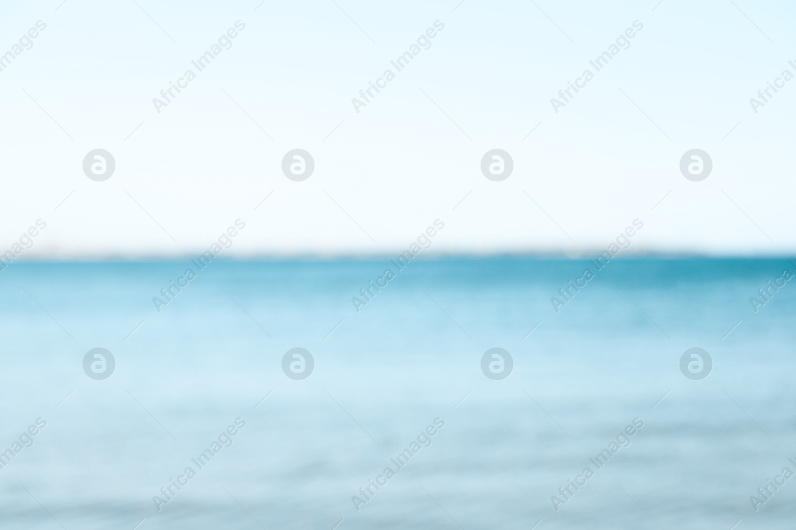 Photo of Beautiful sea under light blue sky, blurred view