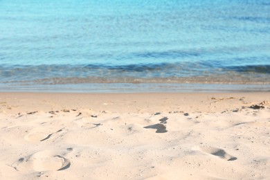 Photo of Beautiful wavy sea and sandy beach on sunny morning