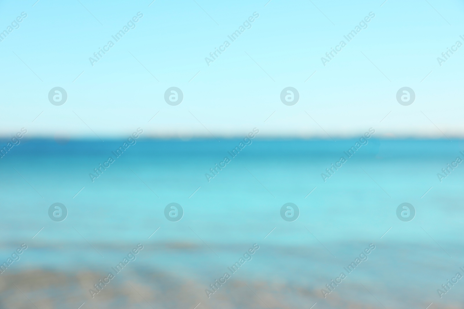 Photo of Beautiful sea under light blue sky, blurred view