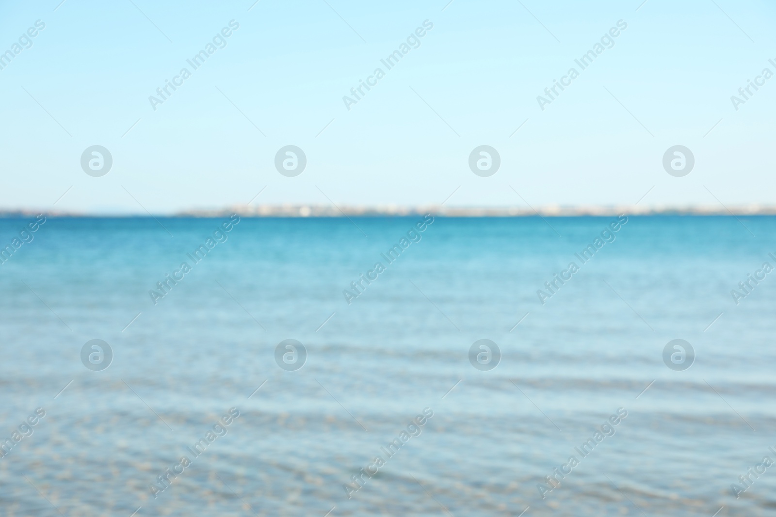 Photo of Beautiful sea under light blue sky, blurred view