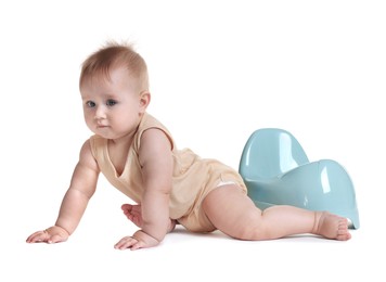 Photo of Cute little baby crawling near potty on white background