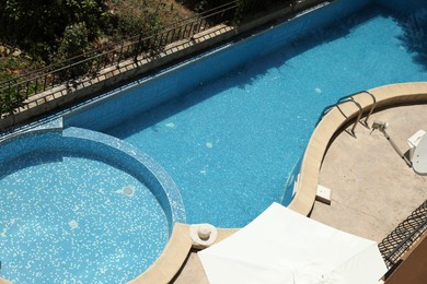 Photo of Outdoor swimming pool at luxury resort, above view