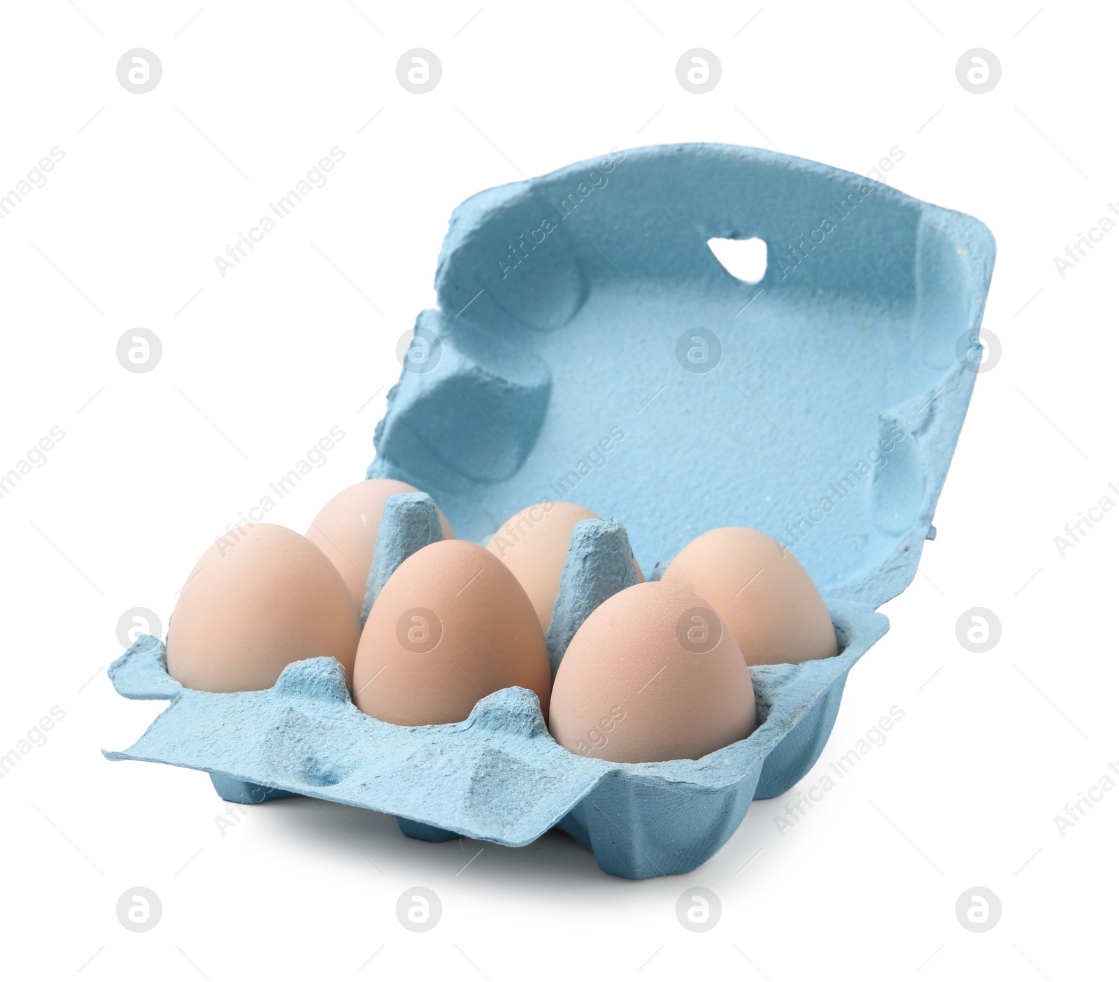 Photo of Raw chicken eggs in egg carton isolated on white