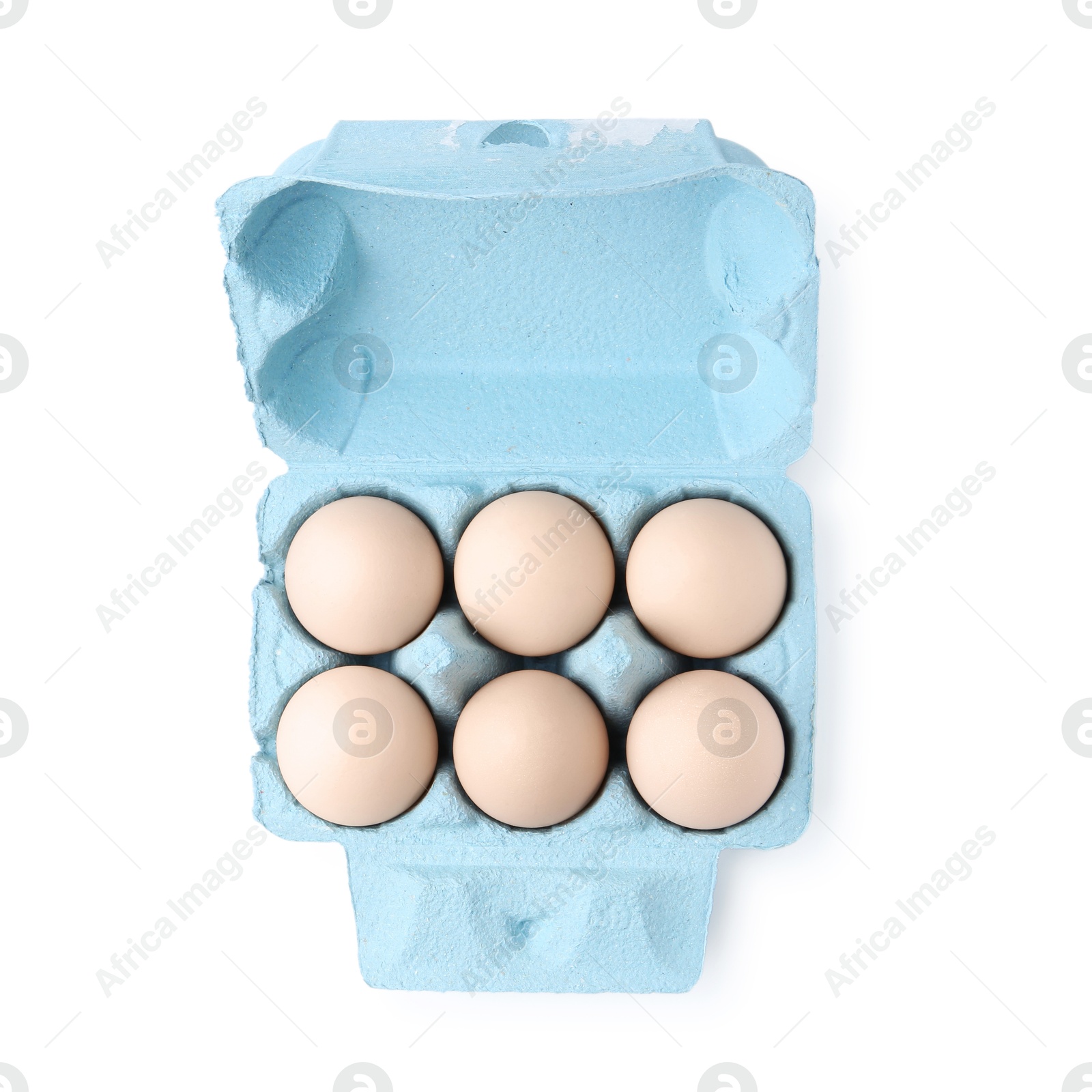 Photo of Raw chicken eggs in egg carton isolated on white, top view