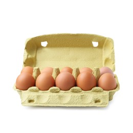 Photo of Raw chicken eggs in egg carton isolated on white