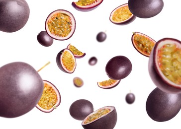 Image of Fresh passion fruits swirling in air against white background