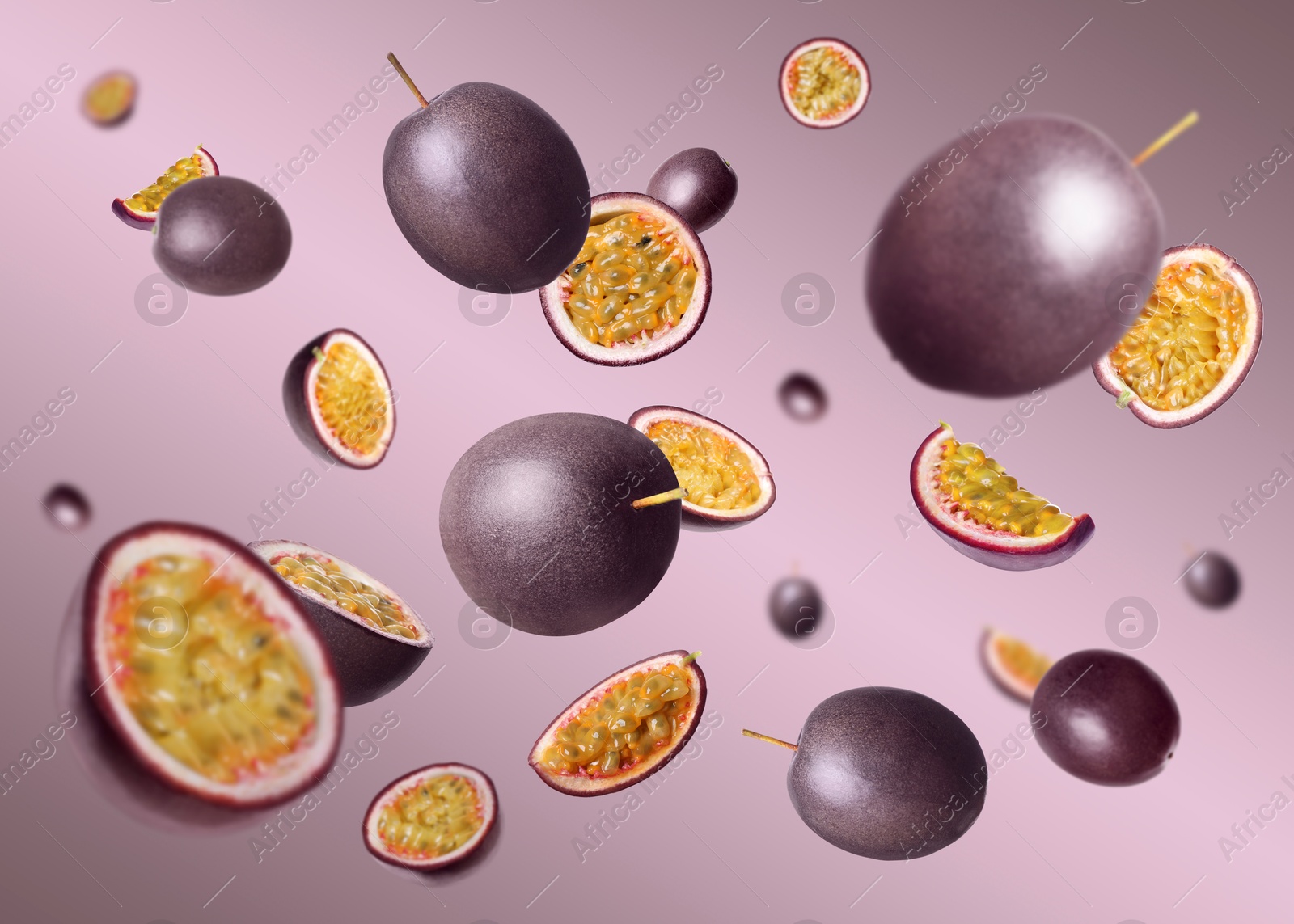 Fresh passion fruits swirling in air against color gradient background Image of Fresh passion fruits swirling in air against color gradient background