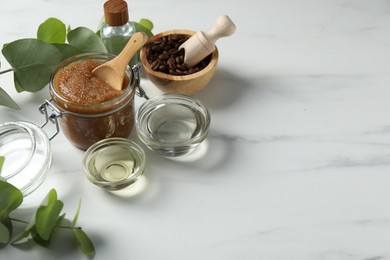 Photo of Natural body scrub and ingredients on white table. Space for text