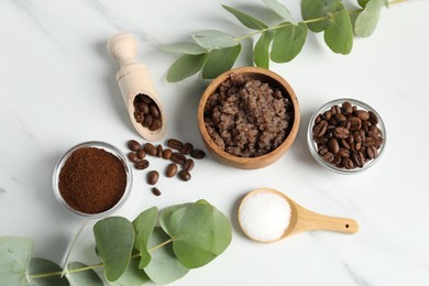 Photo of Natural body scrub and ingredients on white table, flat lay