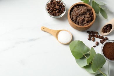 Photo of Natural body scrub and ingredients on white table, flat lay. Space for text
