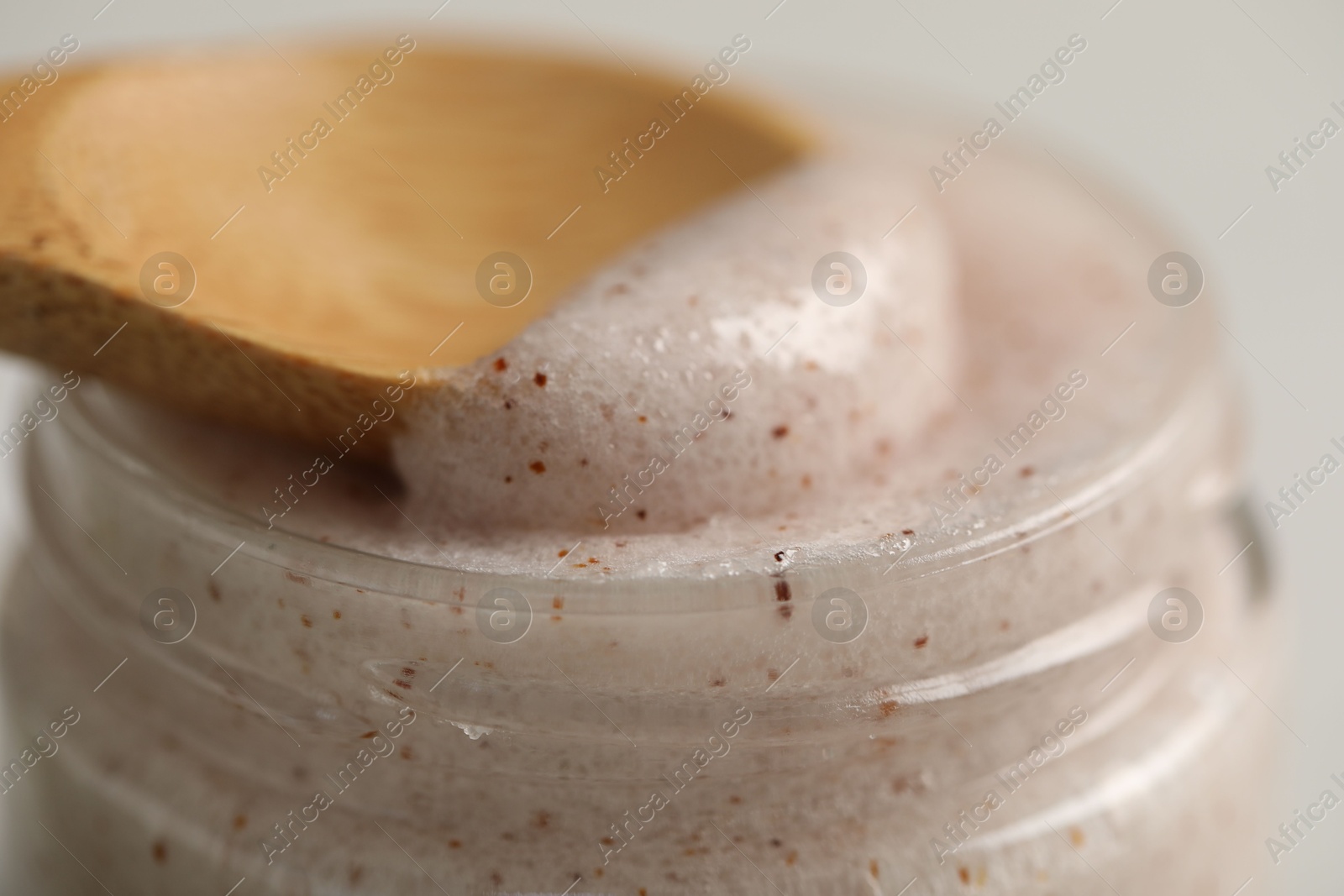 Photo of Natural body scrub on white table, closeup