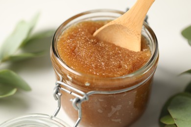 Photo of Natural body scrub on white table, closeup