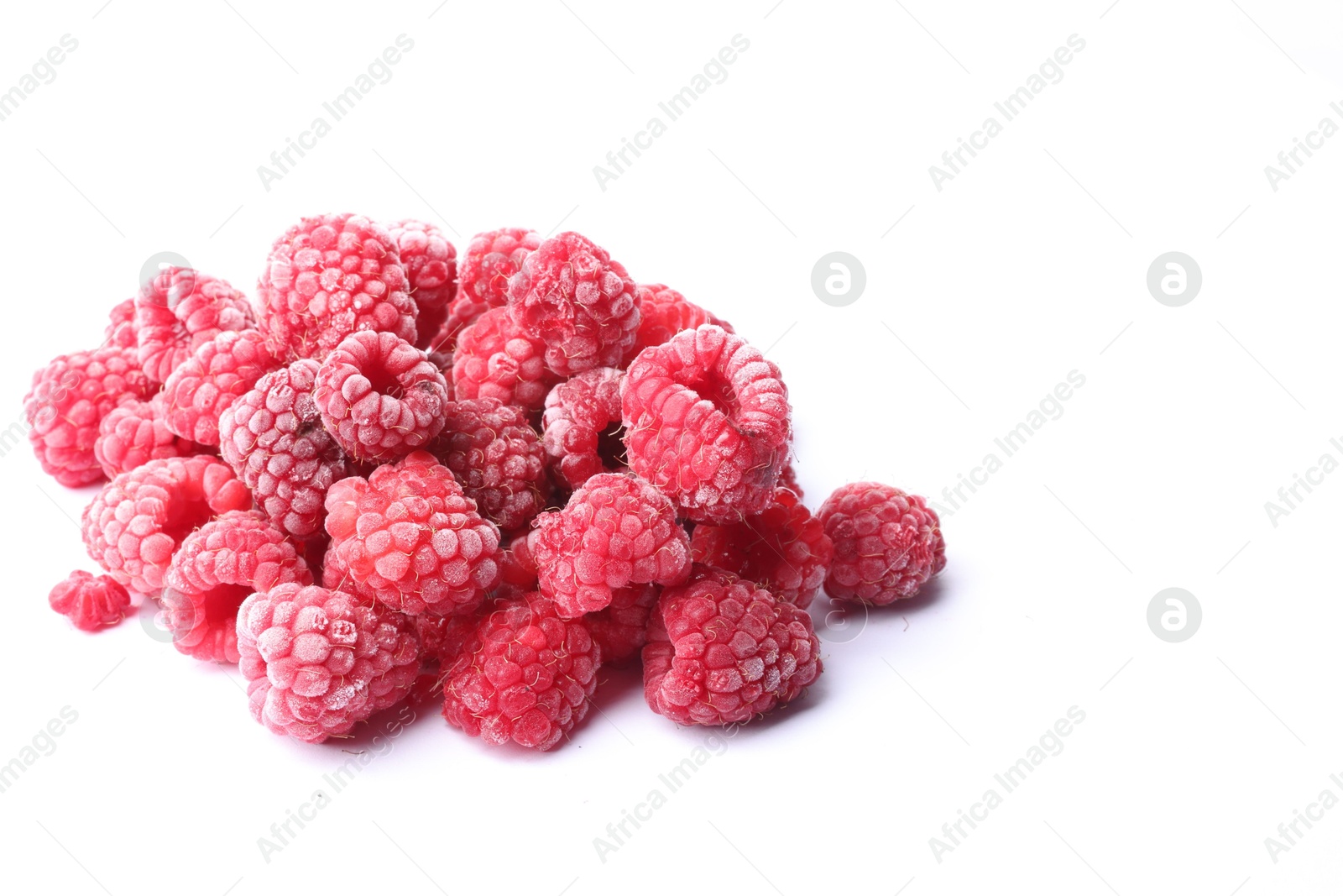 Photo of Heap of frozen raspberries on white background, space for text