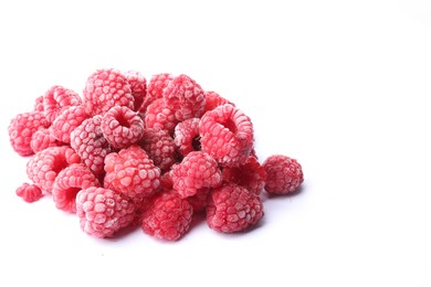Photo of Heap of frozen raspberries on white background, space for text