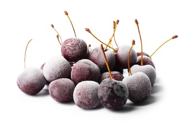Photo of Heap of frozen cherries isolated on white