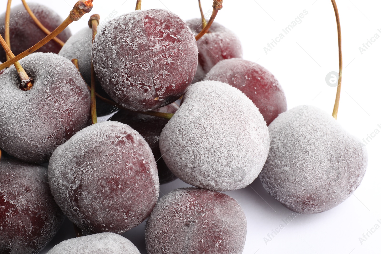 Photo of Many frozen cherries on white background, closeup