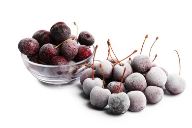 Photo of Many ripe frozen cherries isolated on white