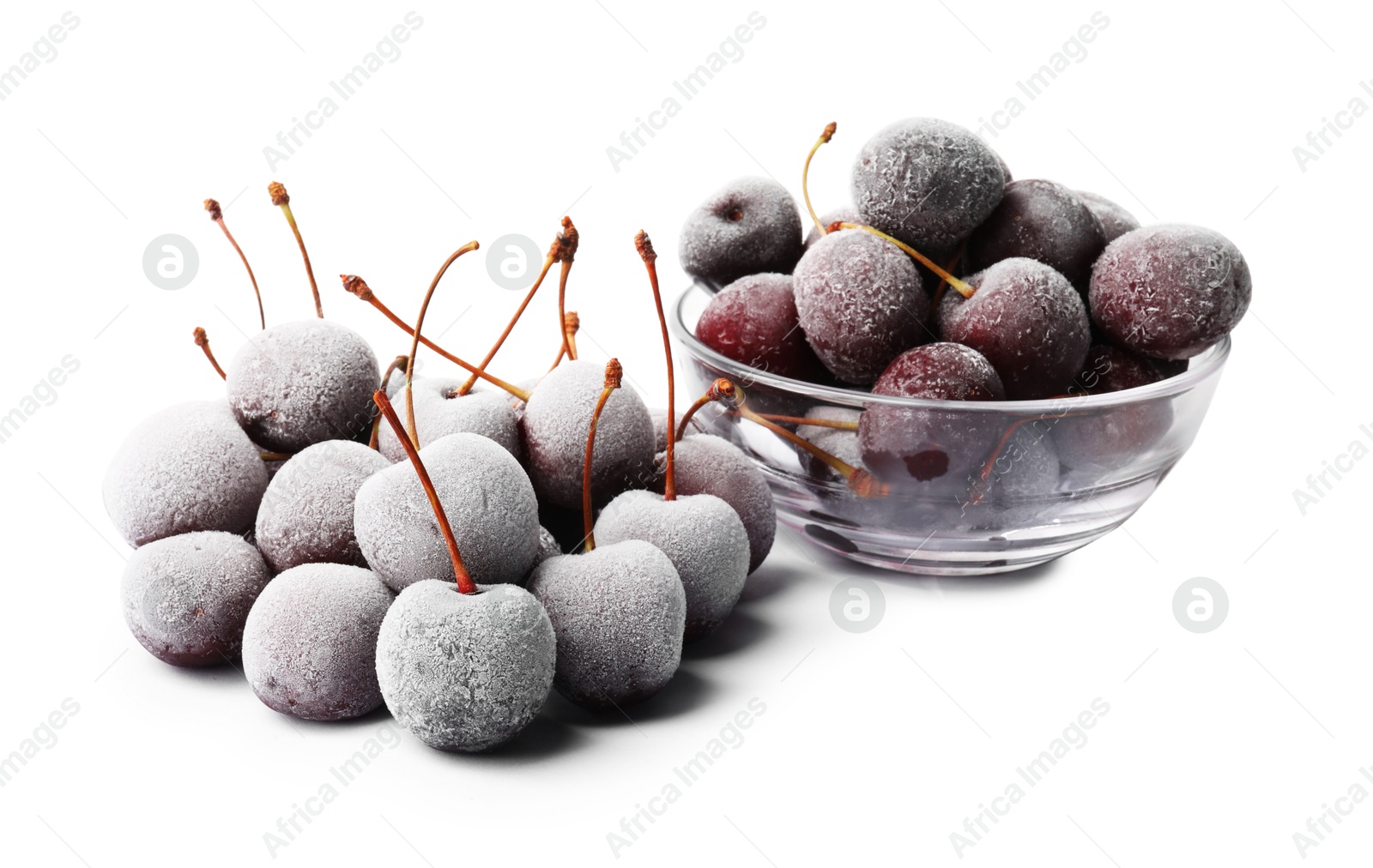 Photo of Many ripe frozen cherries isolated on white