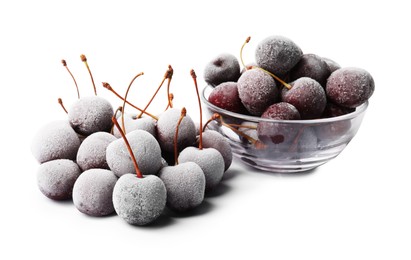 Photo of Many ripe frozen cherries isolated on white