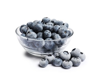 Photo of Frozen blueberries in glass bowl isolated on white