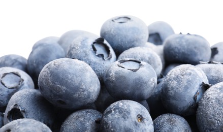 Photo of Heap of frozen blueberries on white background, closeup