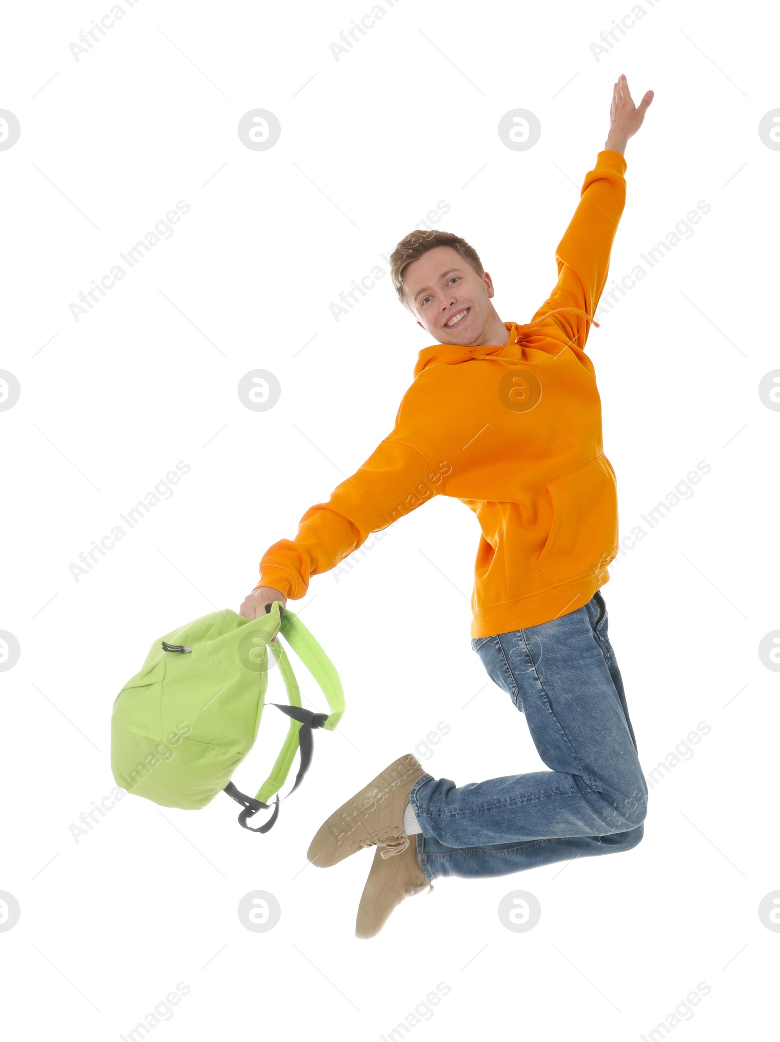 Portrait of happy young man with backpack jumping on white background Photo of Portrait of happy young man with backpack jumping on white background