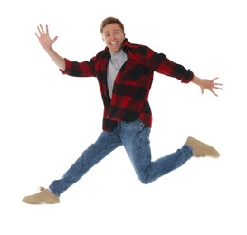 Photo of Portrait of happy young man jumping on white background
