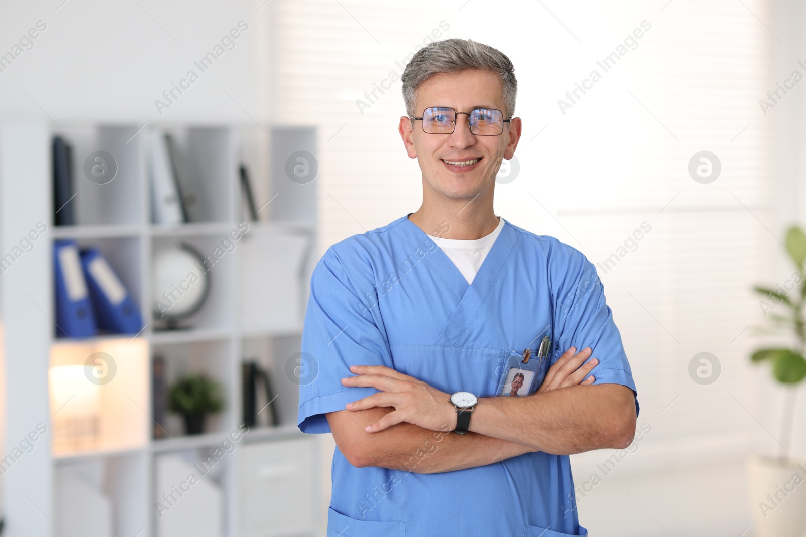 Photo of Portrait of doctor in scrubs at clinic
