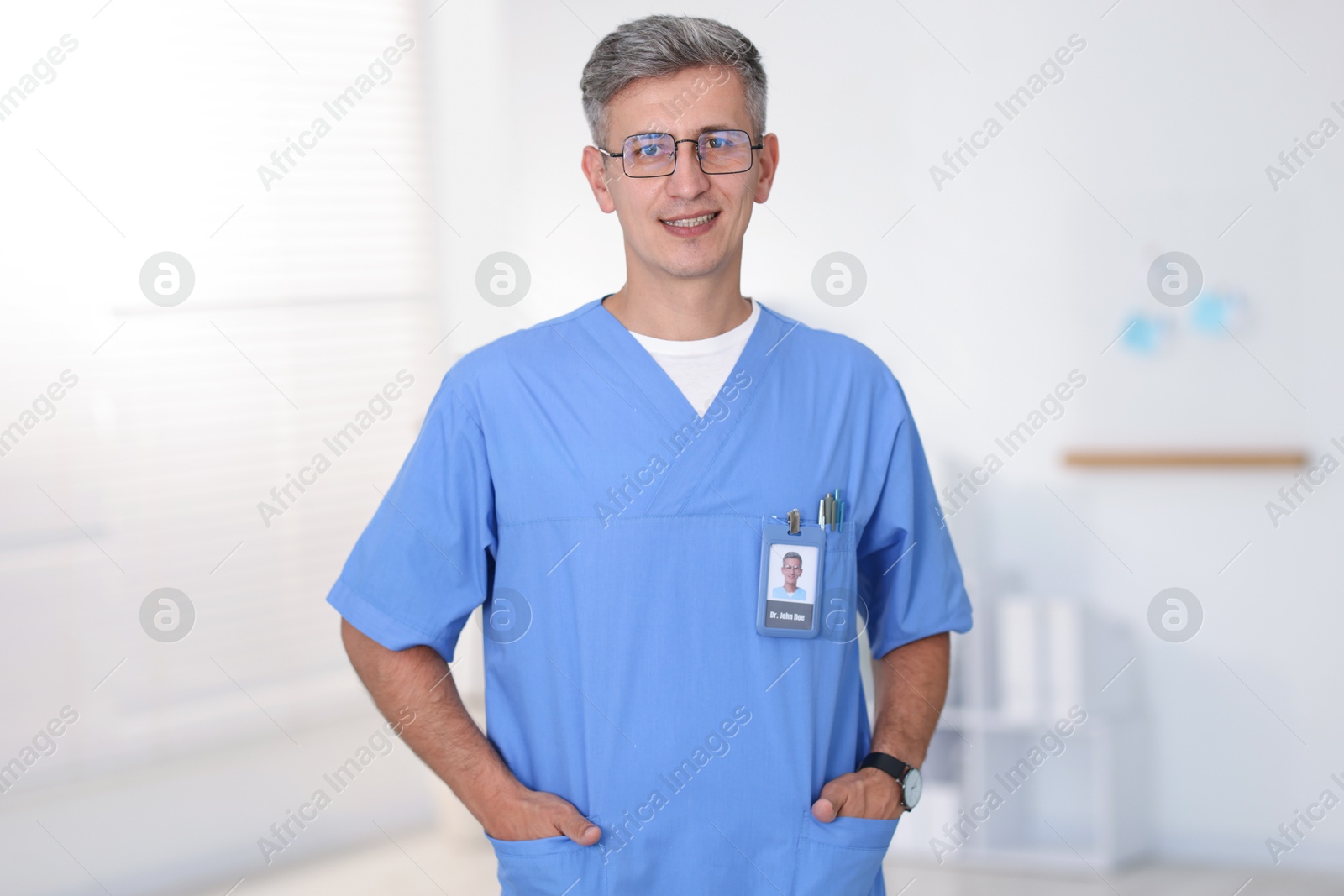 Photo of Portrait of doctor in scrubs at clinic