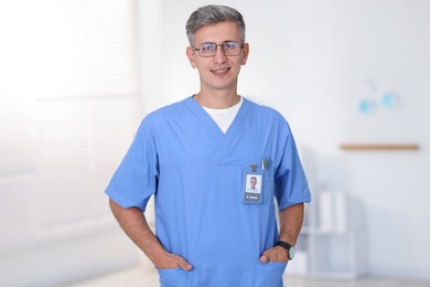 Photo of Portrait of doctor in scrubs at clinic