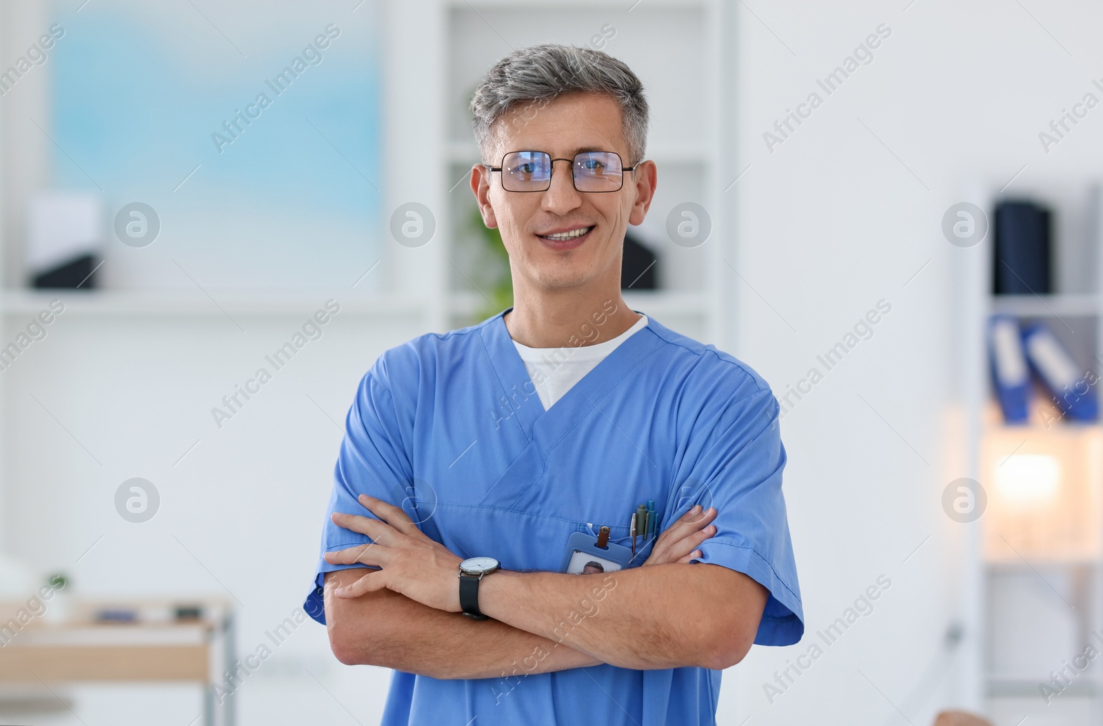 Photo of Portrait of doctor in scrubs at clinic