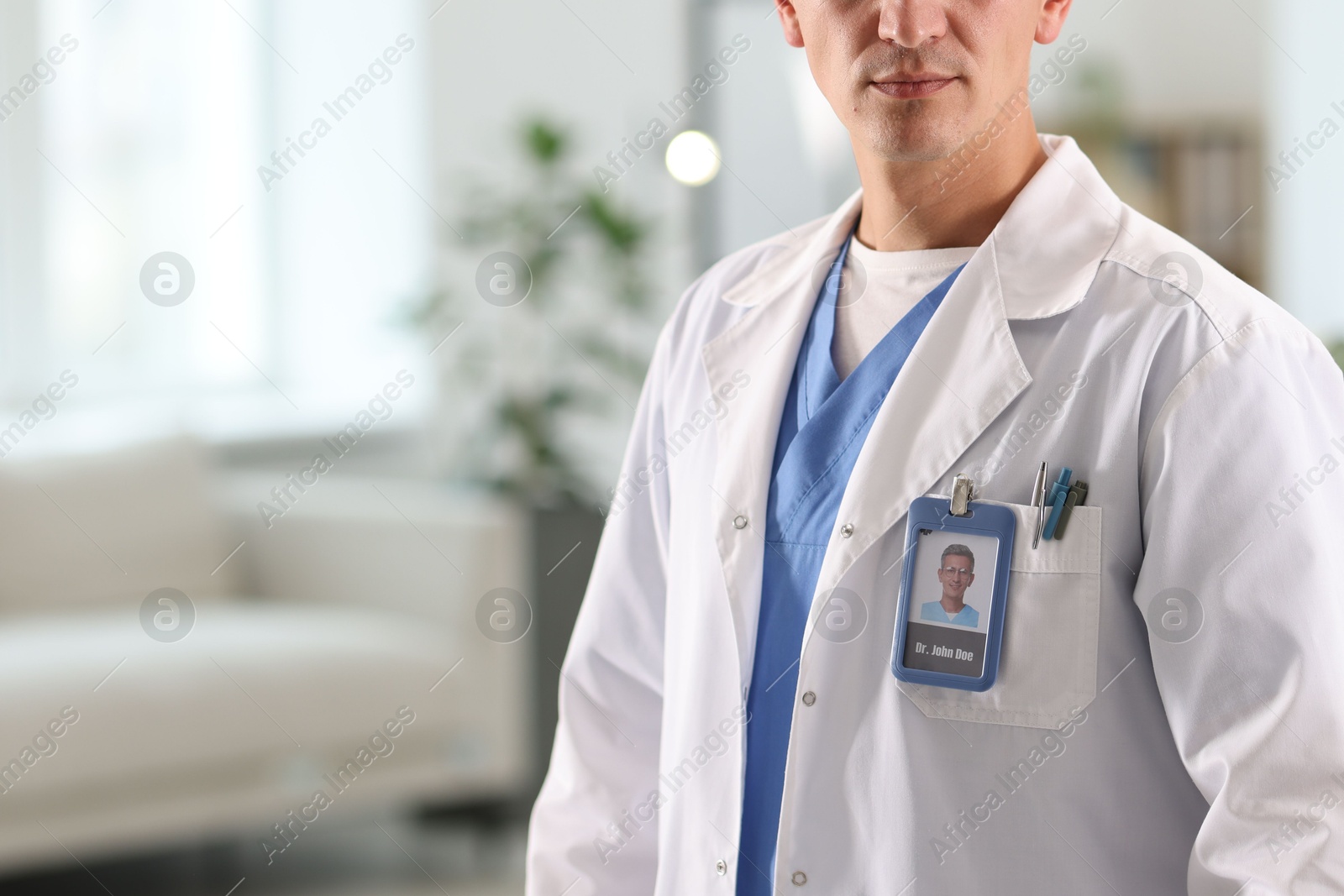 Photo of Doctor in white coat at clinic, closeup