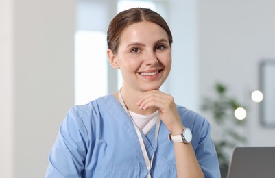 Photo of Telemedicine. Doctor having video call with patient, view from camera
