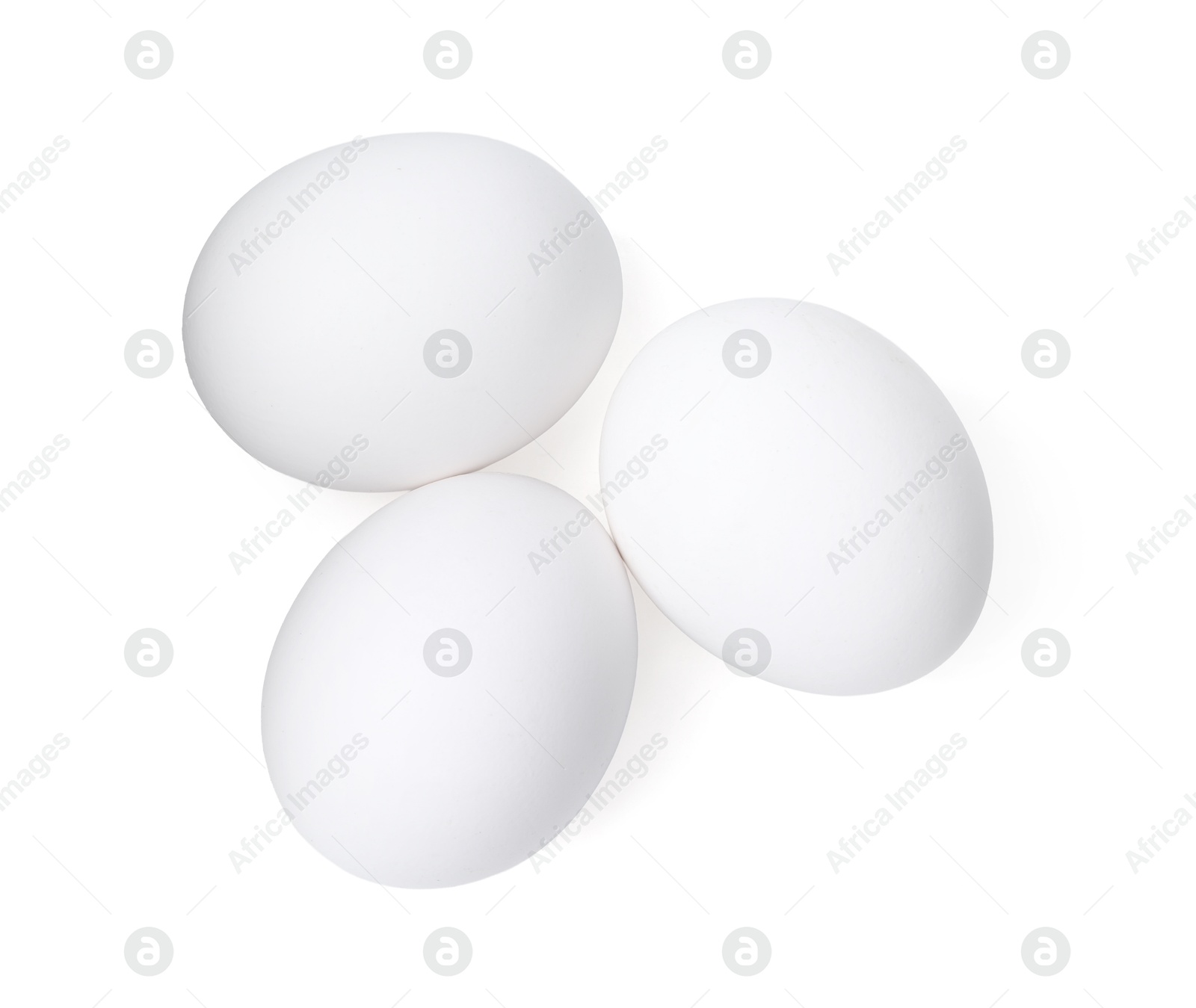 Raw chicken eggs isolated on white, top view Photo of Raw chicken eggs isolated on white, top view