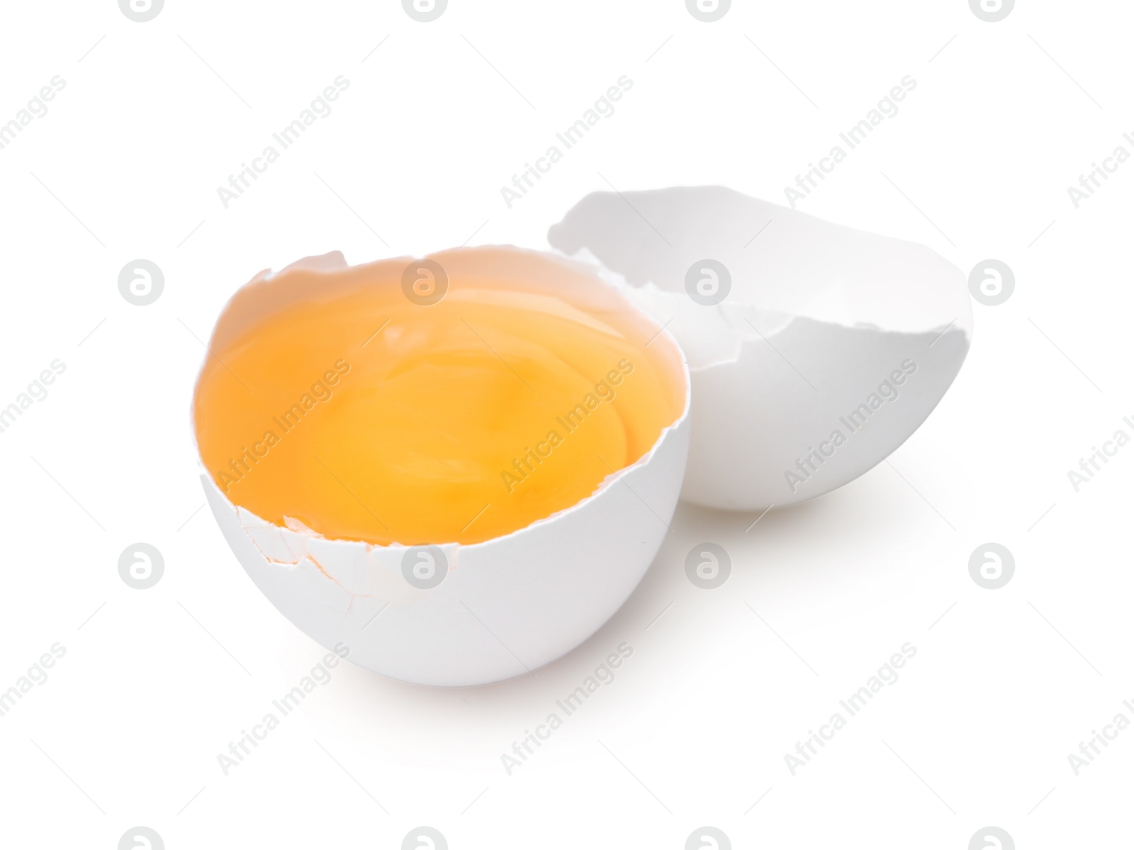 One broken chicken egg isolated on white Photo of One broken chicken egg isolated on white