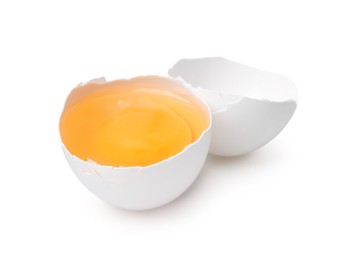 Photo of One broken chicken egg isolated on white
