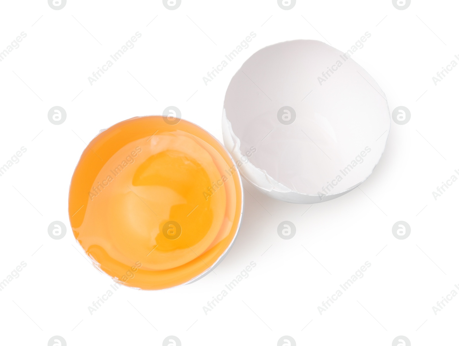 One broken chicken egg isolated on white, top view Photo of One broken chicken egg isolated on white, top view
