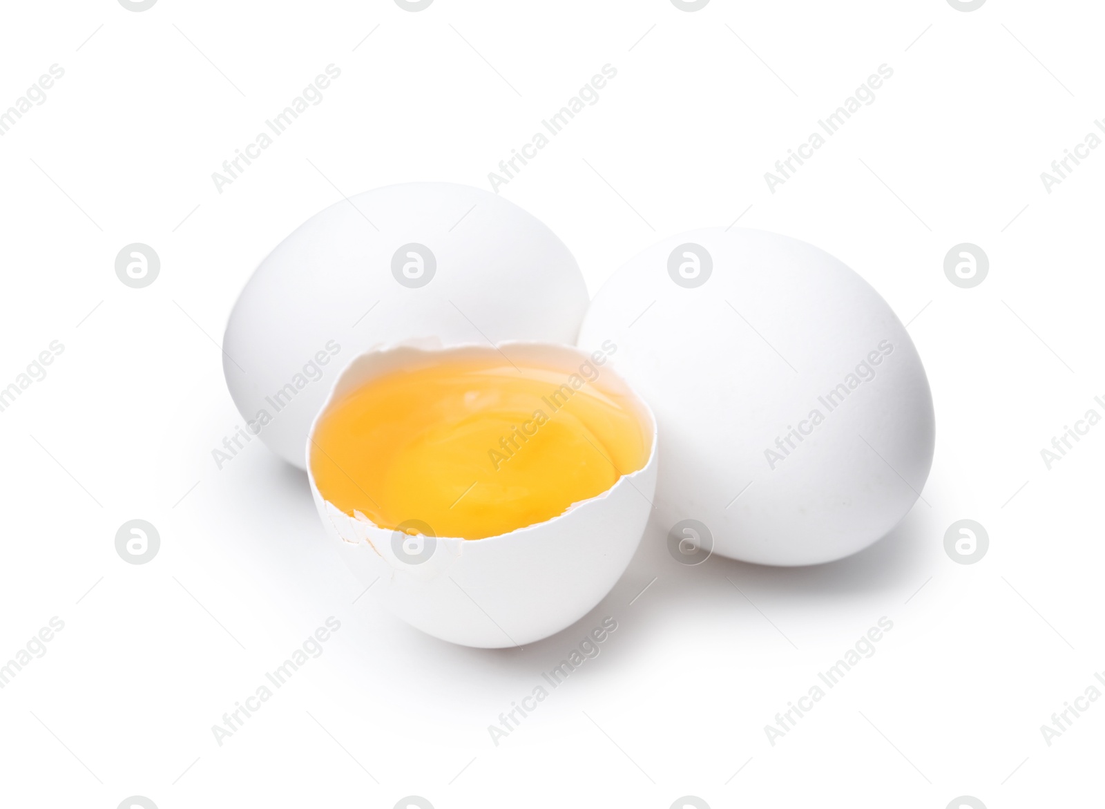 Whole and broken chicken eggs isolated on white Photo of Whole and broken chicken eggs isolated on white