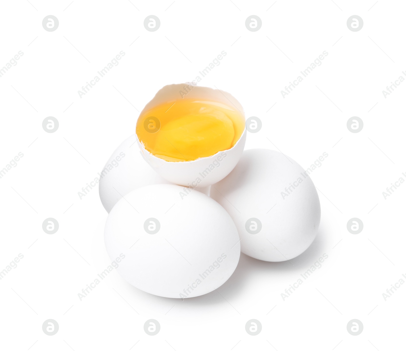 Whole and broken chicken eggs isolated on white Photo of Whole and broken chicken eggs isolated on white