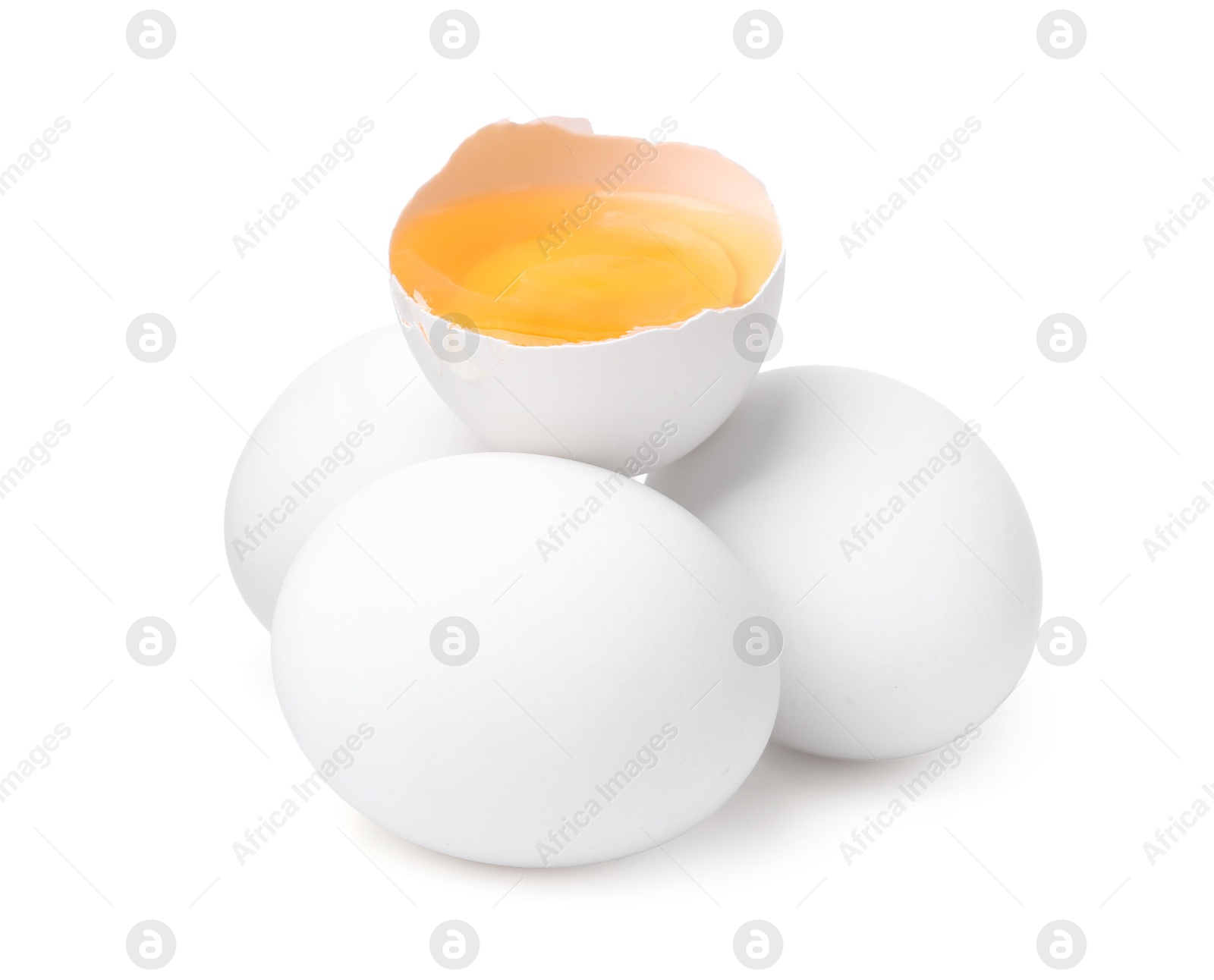 Whole and broken chicken eggs isolated on white Photo of Whole and broken chicken eggs isolated on white