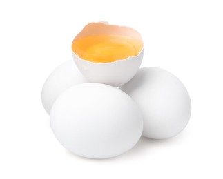 Photo of Whole and broken chicken eggs isolated on white