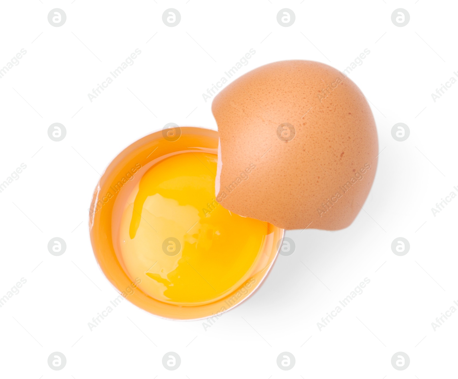One broken chicken egg isolated on white, top view Photo of One broken chicken egg isolated on white, top view