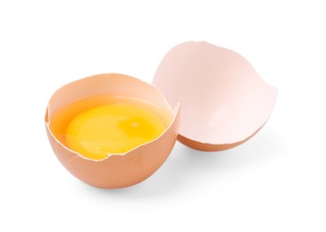 Photo of One broken chicken egg isolated on white